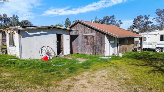 exterior space with a yard