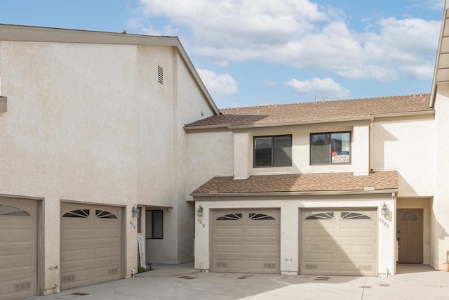 exterior space featuring a garage