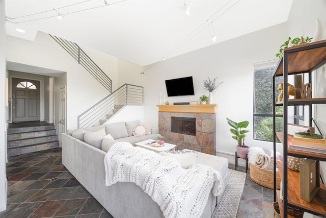 living room featuring a fireplace