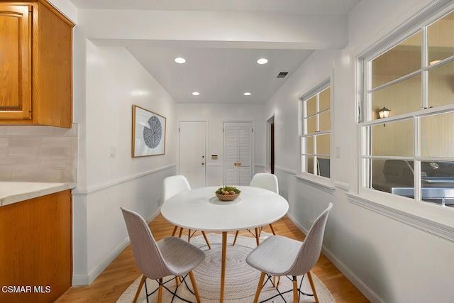 dining room featuring light hardwood / wood-style flooring