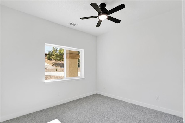 unfurnished room featuring carpet and ceiling fan