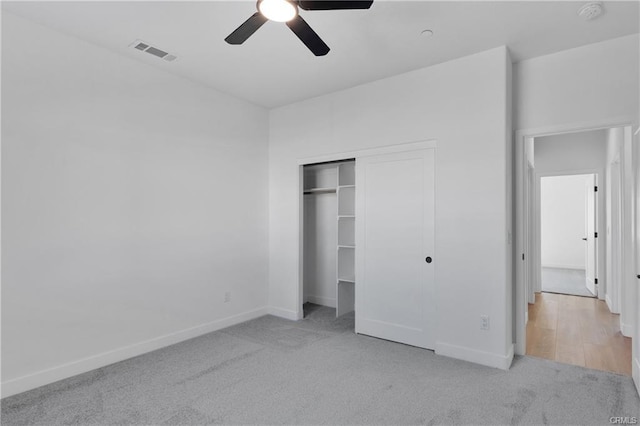 18554 Temecula Ave, Hesperia, CA 92345 - unfurnished bedroom with carpet, baseboards, a closet, and ceiling fan