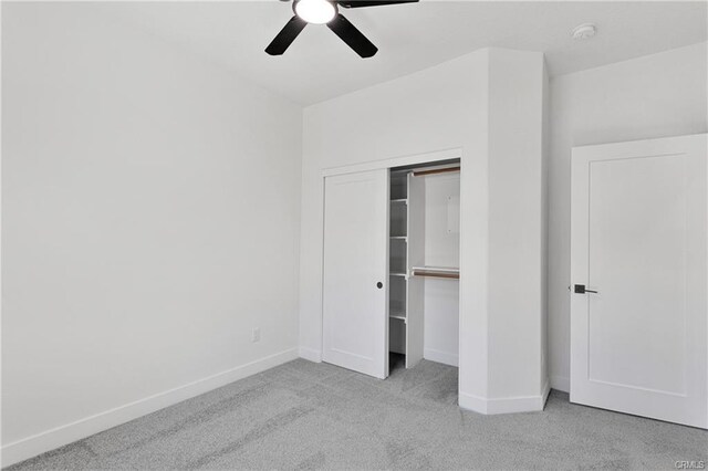 18554 Temecula Ave, Hesperia, CA 92345 - unfurnished bedroom featuring carpet floors, baseboards, a closet, and a ceiling fan