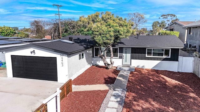 ranch-style house featuring a garage