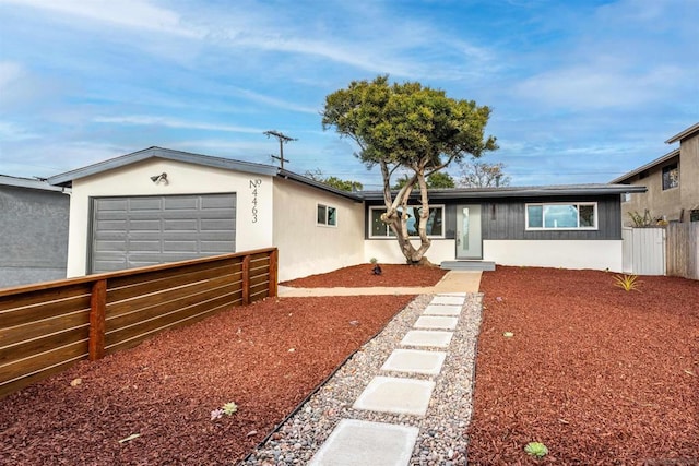 single story home featuring a garage