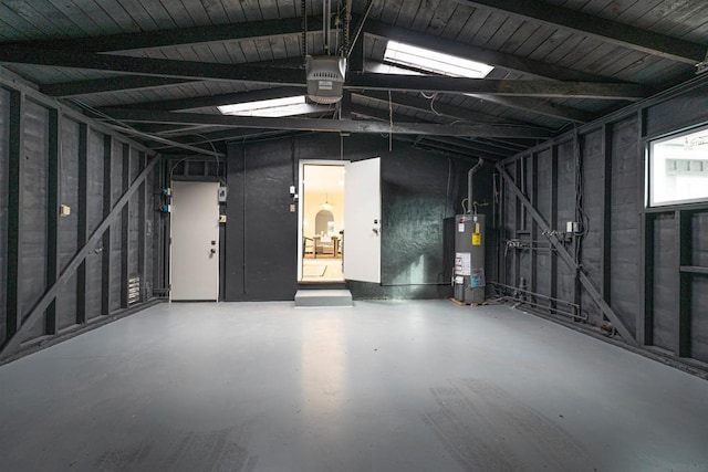 garage featuring a garage door opener and water heater