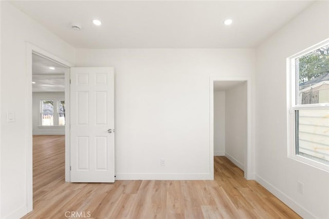 empty room featuring light hardwood / wood-style floors