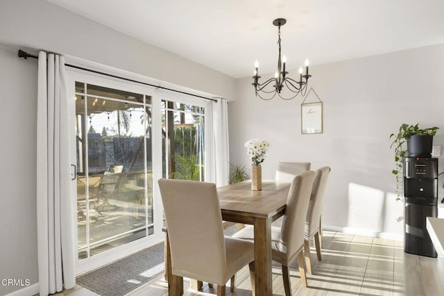 dining room featuring a notable chandelier