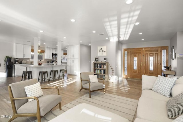 living room featuring light wood-type flooring