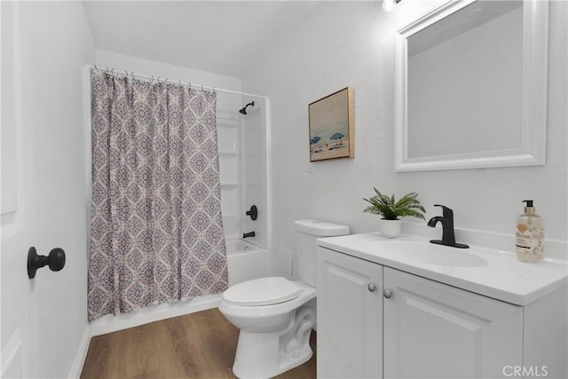 full bathroom featuring shower / bath combo, wood-type flooring, vanity, and toilet