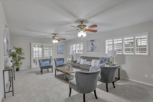 living room featuring light colored carpet and a healthy amount of sunlight