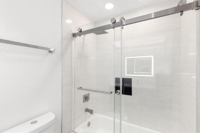 2173 N Viminal Rd, Palm Springs, CA 92262 - bathroom featuring toilet and shower / bath combination with glass door