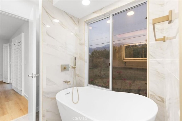 2173 N Viminal Rd, Palm Springs, CA 92262 - full bathroom with a freestanding tub, recessed lighting, a mountain view, and wood finished floors