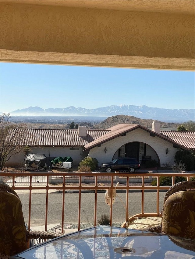 balcony featuring a mountain view