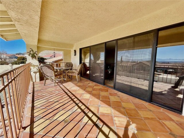 balcony featuring a mountain view