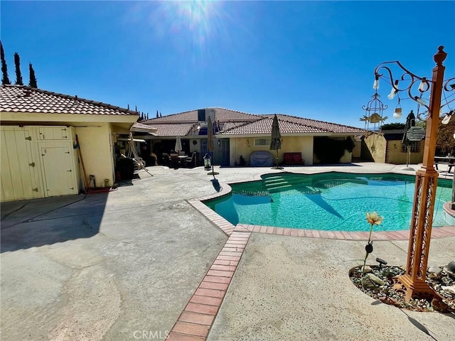 view of pool with a patio