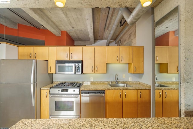 kitchen with appliances with stainless steel finishes and sink