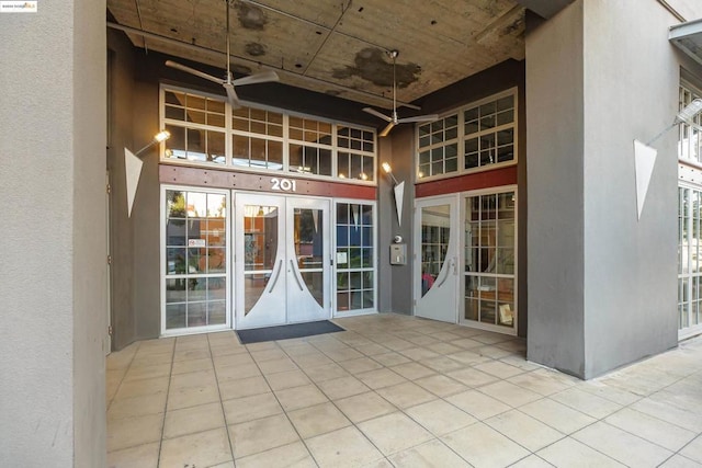 doorway to property with a patio and french doors