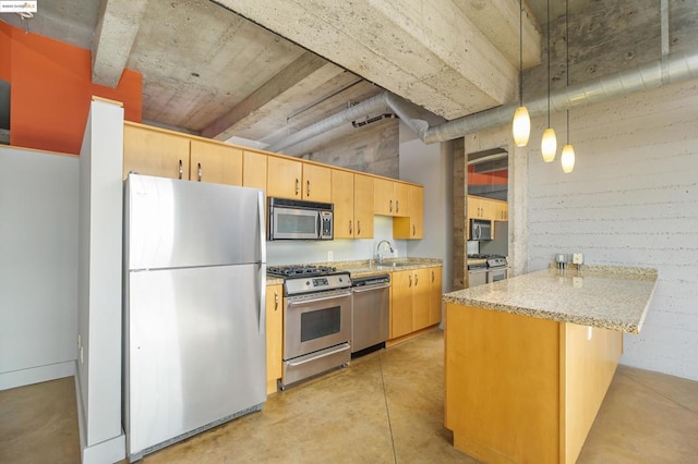 kitchen with light brown cabinetry, sink, hanging light fixtures, appliances with stainless steel finishes, and kitchen peninsula