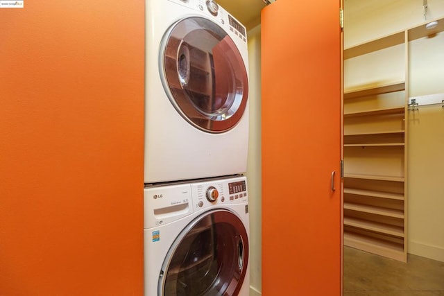 laundry room featuring stacked washer / dryer