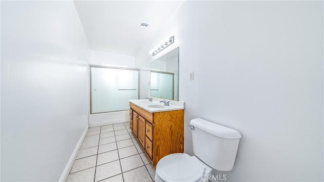 full bathroom featuring enclosed tub / shower combo, vanity, tile patterned floors, and toilet