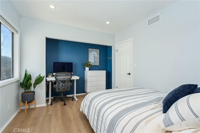 bedroom featuring light hardwood / wood-style flooring