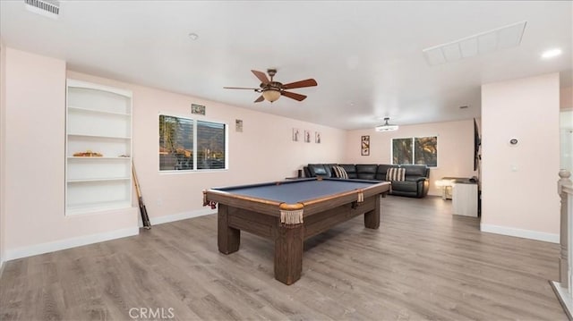 playroom featuring built in shelves, billiards, ceiling fan, and light hardwood / wood-style floors