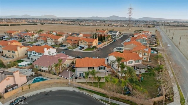 drone / aerial view featuring a mountain view