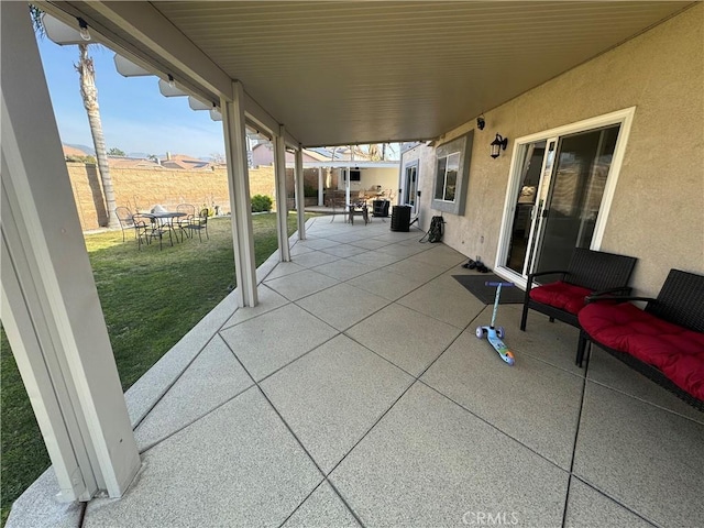 view of patio with a mountain view and an outdoor hangout area