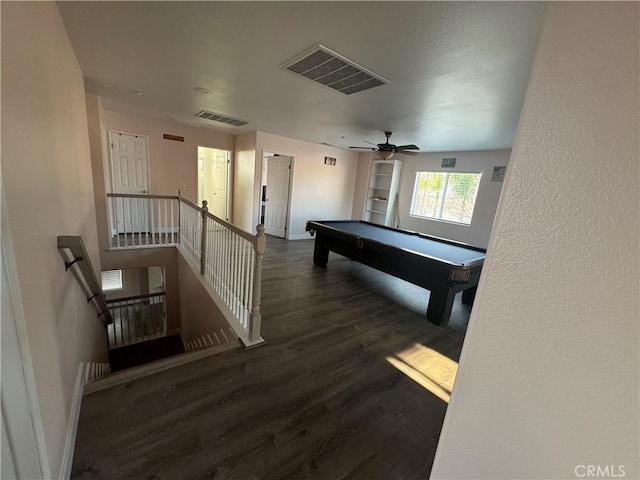 game room with dark hardwood / wood-style floors, ceiling fan, and billiards