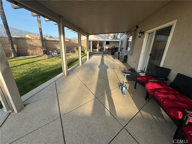 view of patio / terrace featuring a mountain view