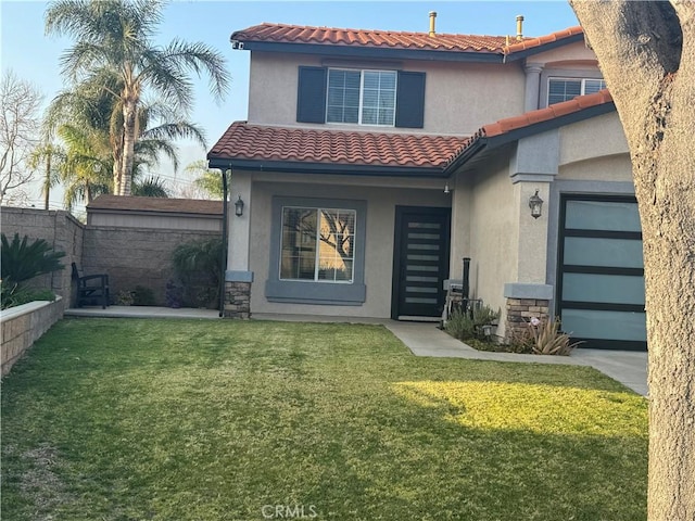 view of front of property with a front lawn