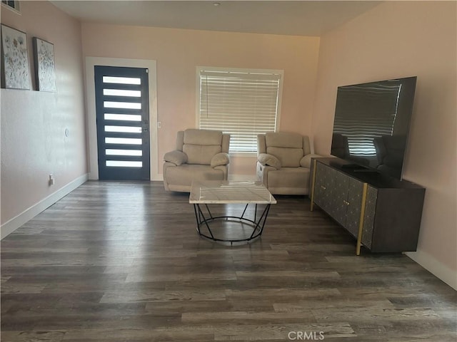 living room featuring dark hardwood / wood-style flooring