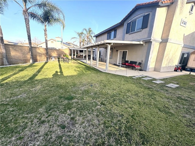 view of yard with a patio area and fence