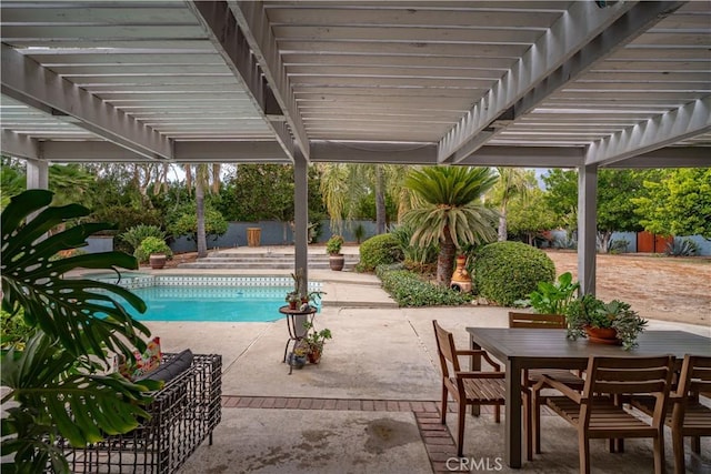 view of swimming pool featuring a pergola and a patio