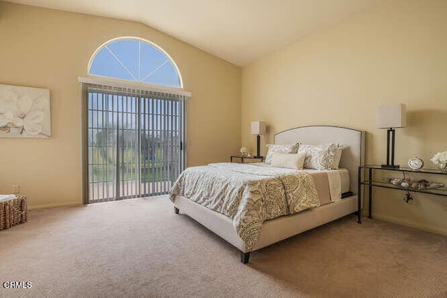 carpeted bedroom with multiple windows and high vaulted ceiling