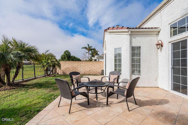 view of patio with a fenced backyard