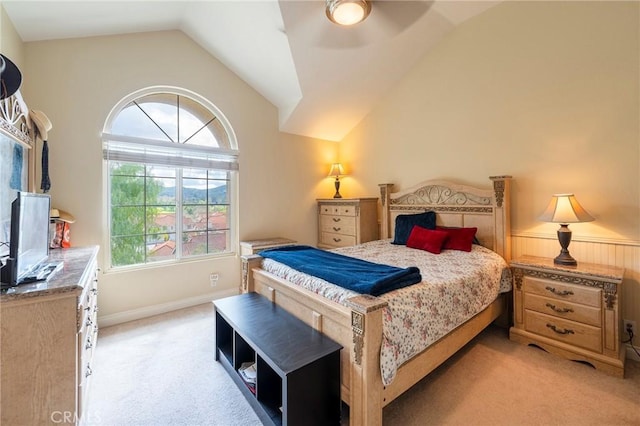 bedroom with light carpet, lofted ceiling, and ceiling fan