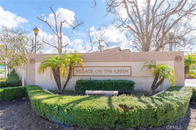 view of community sign