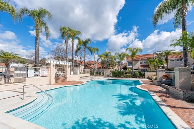 view of pool featuring a pergola and a patio area