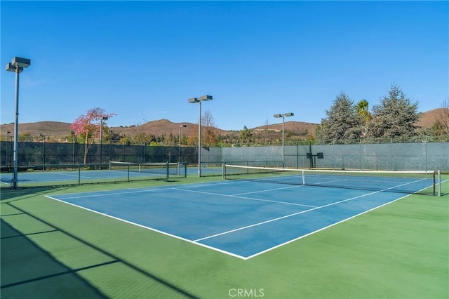 view of sport court featuring a mountain view