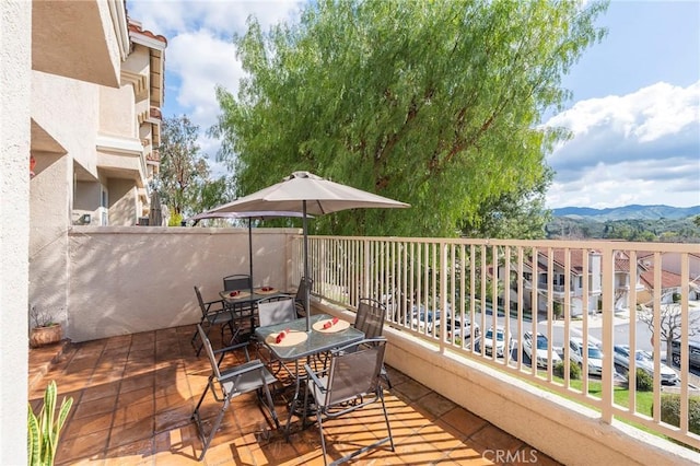 wooden deck with a mountain view