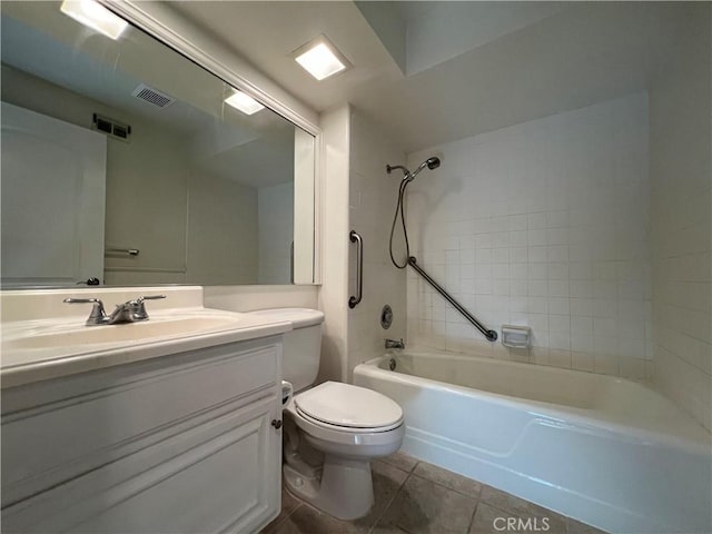 bathroom with tile patterned floors, visible vents, toilet,  shower combination, and vanity