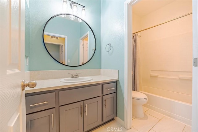 full bathroom with tile patterned flooring, vanity, shower / bath combo with shower curtain, and toilet