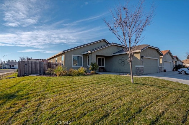 ranch-style home featuring a garage and a front yard