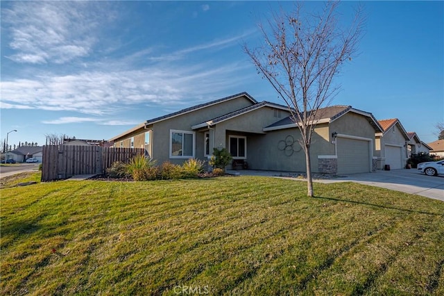 ranch-style home with a garage and a front yard