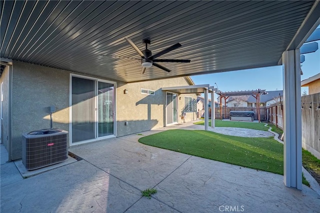 view of patio / terrace featuring central AC unit, ceiling fan, and a pergola