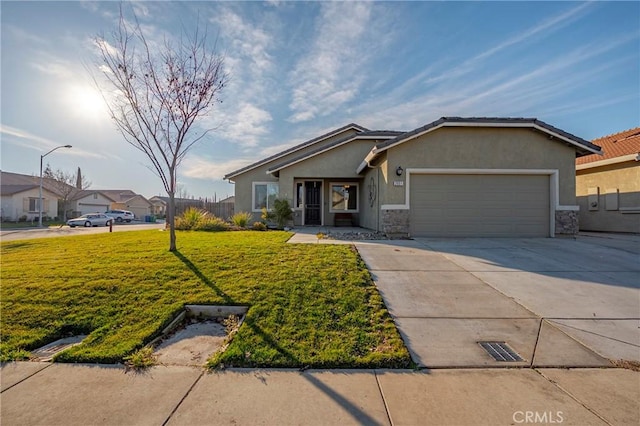 ranch-style home featuring a garage and a front yard