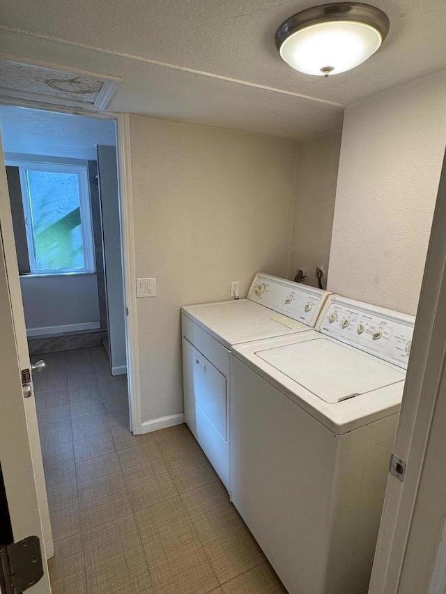 washroom featuring independent washer and dryer