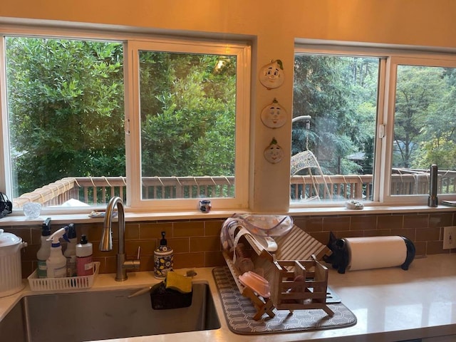 sunroom featuring sink